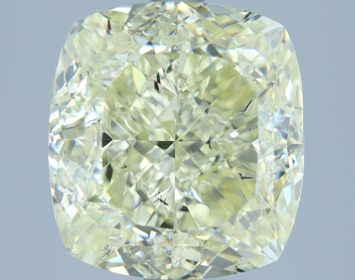 5.01 ct Cushion, W-X SI2