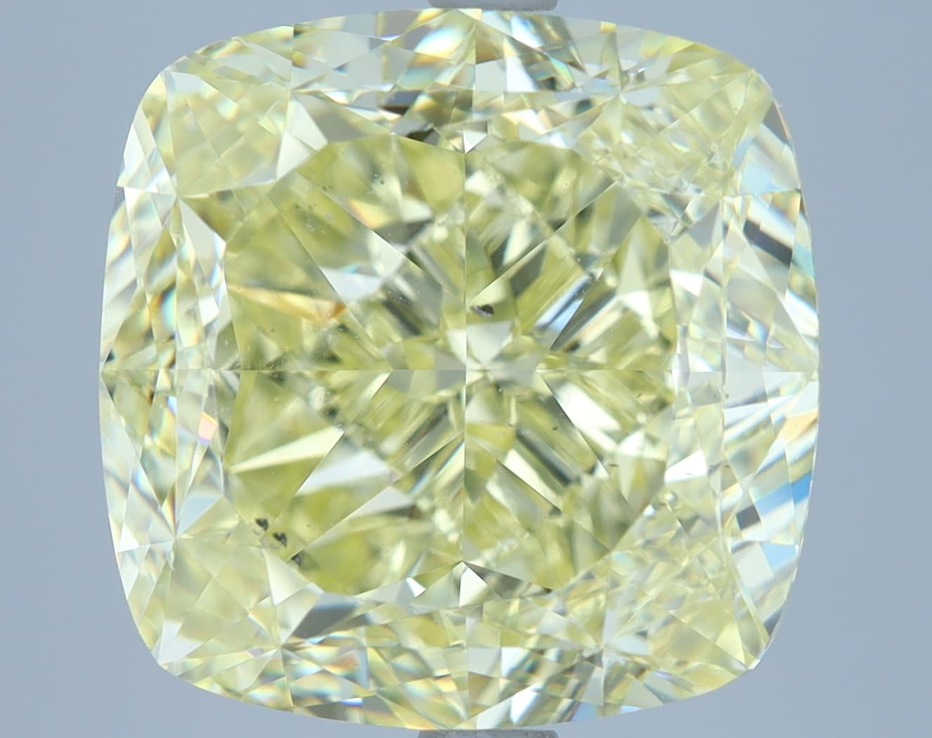 8.05 ct Cushion, Fancy Yellow SI1