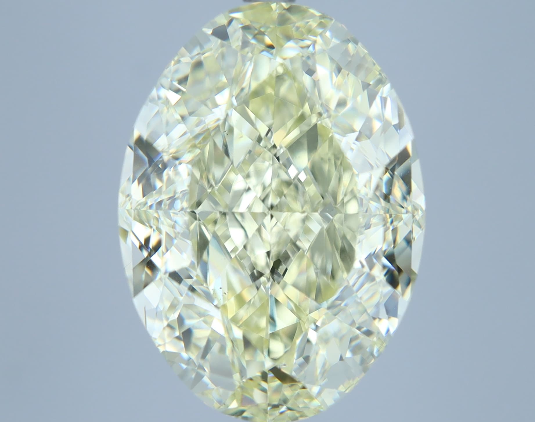 10.01 ct Oval, Fancy Light Yellow VS2